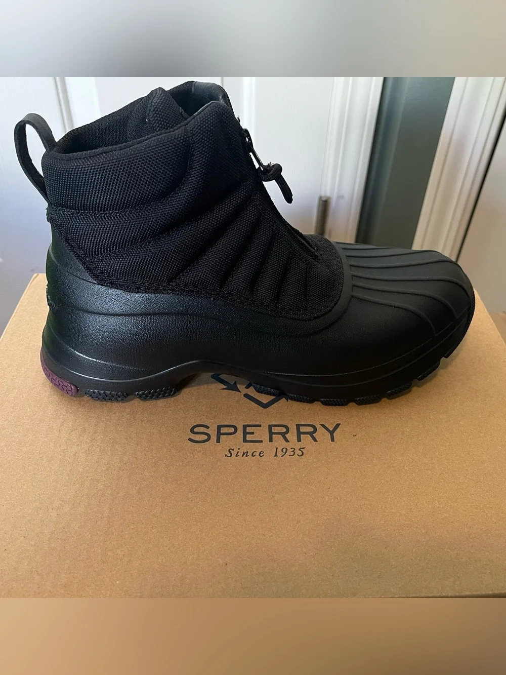 Sperry Women’s duck float zip boots.